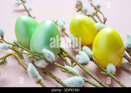Vivid Spring Scene With Eggs And Willow Catkins On Pink Surface Stock Photo