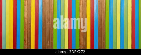 Colorful panoramic wooden wall made of vertical boards in different colors Stock Photo