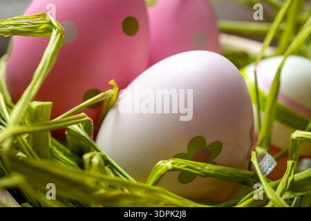 Studio Lighting Highlights Pink And White Easter Eggs In Nest Stock Photo