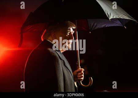 President Donald Trump speaks with members of the media before boarding Marine One on the South Lawn of the White House en route to Joint Base Andrews Stock Photo