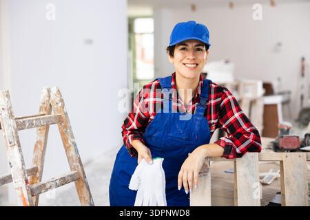 Portrait of smiling woman builder Stock Photo