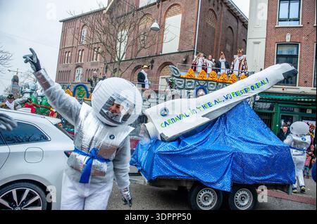 Nijmegen, Netherlands. 15th Feb, 2026. A woman is dancing in an astronaut costume. The Carnival was celebrated with a parade featuring a colorful collection of themed floats, carnival groups, and associations. The main attraction each year is the costume that the Mayor of the city, Huber Bruls, will be wearing. This year, the theme was the Smurfs. Credit: SOPA Images Limited/Ģ����ý Live News Stock Photo