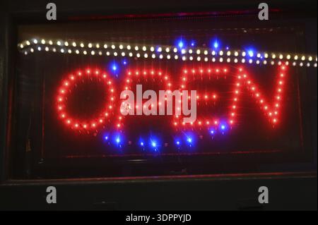 Neon sign opened Stock Photo