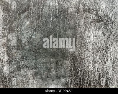 white acrylic paint texture on dark gray canvas. highly textured background. Stock Photo