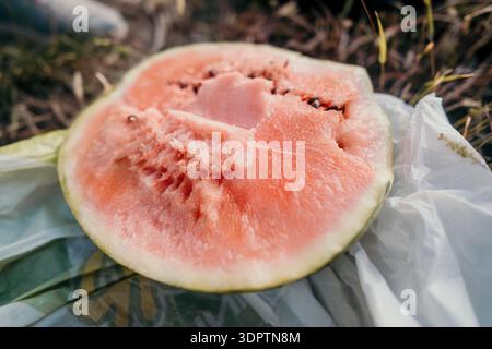 Watermelon Slice on a White Plastic Bag Stock Photo