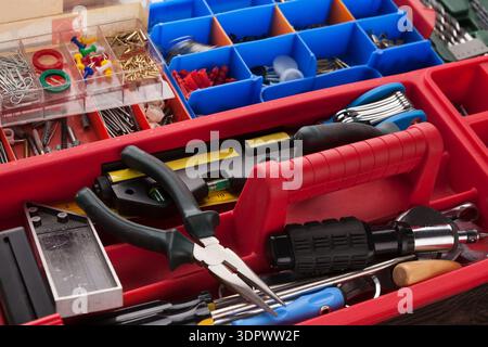 Tool Box Filled With Tools and Supplies for Various Repair and DIY Projects Stock Photo