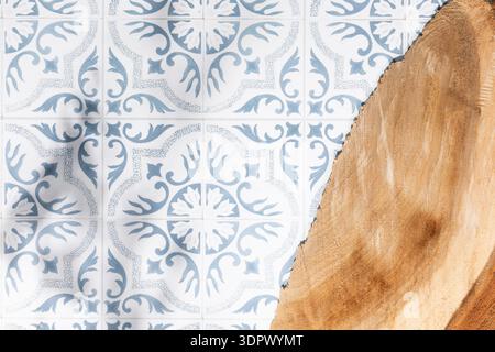 Blue And White Ornamental Tile Pattern With Natural Wood Surface Detail. Concept of Mediterranean Kitchen Interior, Ceramic Wall Background, Rustic Ta Stock Photo