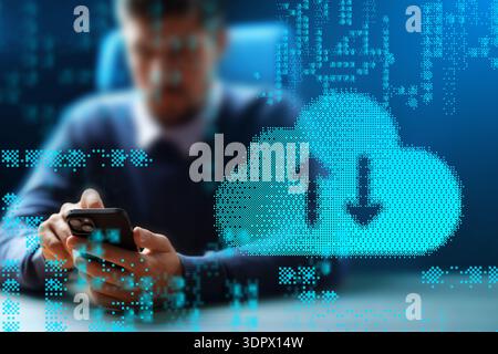 Man using smartphone to access cloud storage for data transfer at office Stock Photo