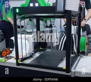 3D printer. 3D printer with a blank build surface. Open 3D printer. 3D printer with an empty work surface. Concept printing technology. Additive progressive FDM technologies Stock Photo
