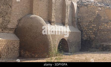 Ancient brick arches and vaulted masonry in Cairo reveal historic Islamic architecture, textured walls and weathered ruins set in soft daylight, evoki Stock Photo