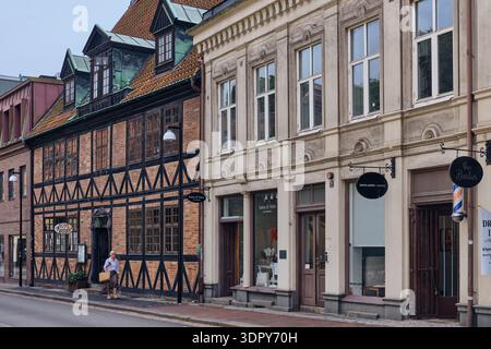 Helsingborg, Sweden - 12 August 2025: View of the street's historic buildings, where brick and timber facades stand in harmony, reflecting the city's Stock Photo