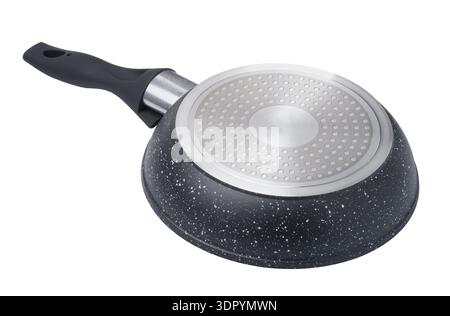 A modern multi stove frying pan. One which works on gas, electric, halogen & induction hobs. Cooking pan with granite coating. Stock Photo