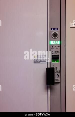 Japanese coin lockers panel at train station in Osaka. Stock Photo