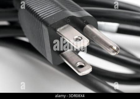 AC power plug American standard and cable on an isolated white background Stock Photo