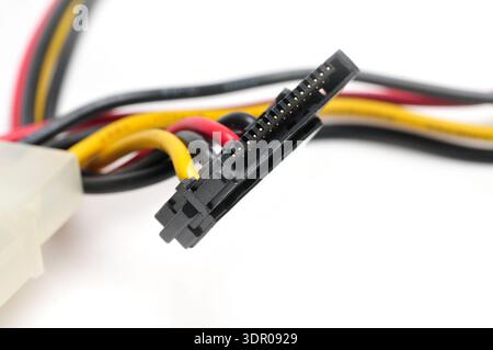 Adapter and plug for connecting SATA drives to the power supply on an isolated white background Stock Photo