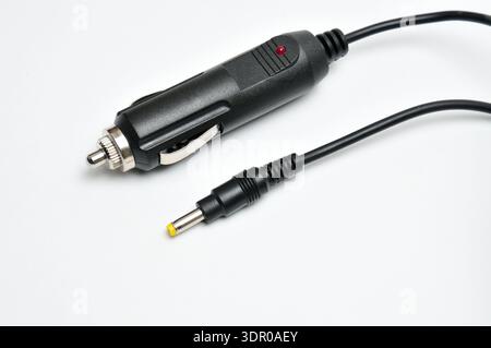 12 volt car adapter on an isolated white background Stock Photo