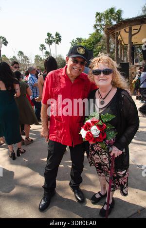 Older bride and groom pose after getting married in a mass wedding in Archer Park on Valentine's Day, McAllen, Texas, USA. FOR EDITORIAL USE ONLY Stock Photo