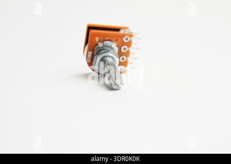 Variable resistor, potentiometer on isolated white background Stock Photo
