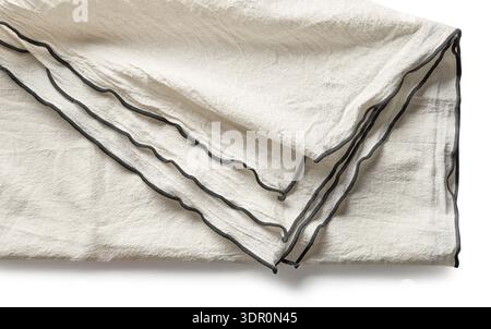 folded crumpled cotton tablecloth closeup top view Stock Photo