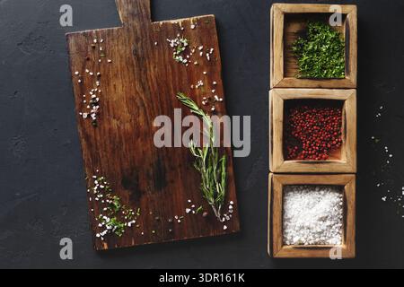 Ingredients Arranged on a Wooden Board With Fresh Herbs and Spices in a Kitchen Setting Stock Photo