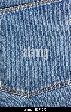 A denium blue jean pocket closeup. View from above of old jeans details. Denim background, texture Stock Photo