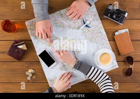Planning a Travel Adventure With Maps, Coffee, and a Camera Stock Photo