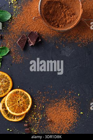 Chocolate and Spice Ingredients Arranged on a Dark Surface for Dessert Preparation Stock Photo