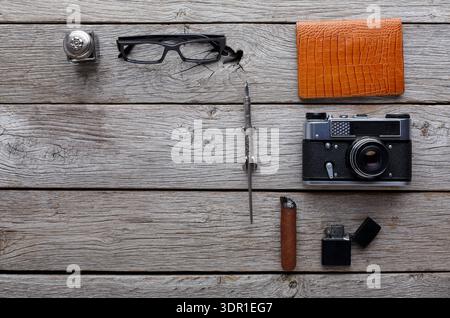 Different Items Arranged on a Wooden Table for a Creative and Artistic Shot Stock Photo