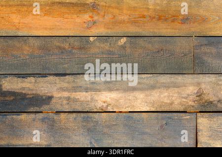 Wooden Planks Arranged in Different Colors and Textures in a Close-Up View on a Surface Stock Photo