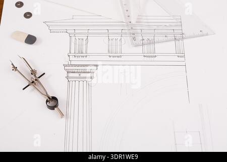 Blueprint Collection of Architectural Designs and Drafting Tools Placed on a Work Surface Stock Photo