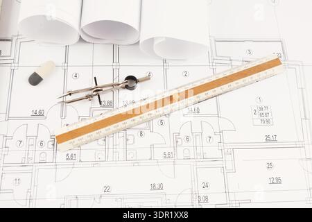 Building Plans and Tools Are Laid out in a Collection on the Desk for Construction Work Stock Photo