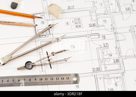 Drawings and Tools Used for Design in Architecture on a Blueprint Layout Stock Photo