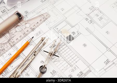 Detailed Collection of Architectural Plans and Tools Arranged on a Design Layout Paper Stock Photo