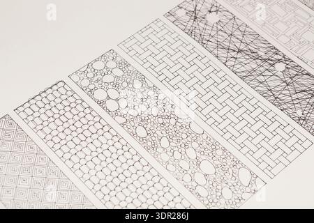 Collection of Black and White Line Art Patterns Arranged in a Unique Collage of Designs Stock Photo