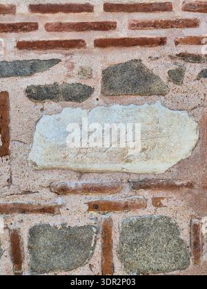 ​Close-up of Opus Mixtum masonry in a Roman fortress, Bulgaria. ​Antique masonry background with natural stone and red clay bricks. Stock Photo