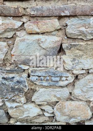 Texture of an ancient stone wall, Roman and Medieval heritage of Plovdiv. Stock Photo