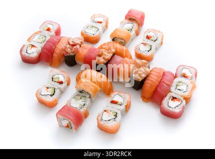 Sushi Selection Arranged on a White Surface With Various Types and Colors of Rolls Stock Photo
