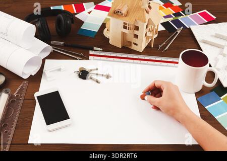 Creative Workspace With Tools and Materials for Design and Planning of Homes and Projects Stock Photo