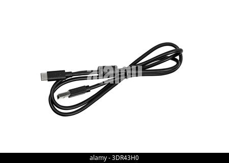 Black USB-A to USB-C charging cable with ferrite bead isolated on white. Stock Photo