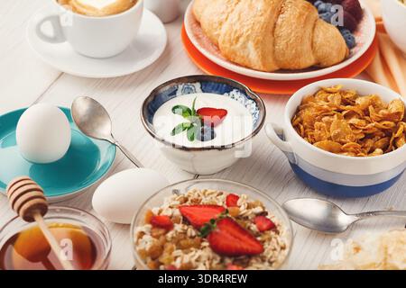 Morning Meal Collection With Various Foods and Drinks Arranged on a Table Stock Photo