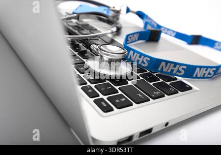 doctor's stethoscope on laptop computer keyboard Stock Photo