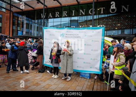 The Lunar New Year 2026 celebrations in Warrington's Time Square to welcome the year of the horse. Warrington Hongkongers put on a show with Dragon Dancing, traditional stalls offering arts and crafts, Chinese toys and gifts, and street food. Classic Hong Kong carnival games were available alongside cultural experiences such as Fai Chun, Chinese calligraphy writing, and fortune telling. Credit: John Hopkins/Alamy Live News Stock Photo