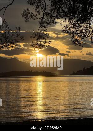 Beautiful sunset over the lake Stock Photo