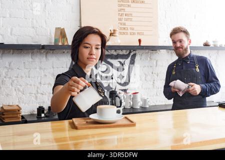 Collage of Barista Serving Coffee in Cafe With Coworker Assisting Behind Counter Stock Photo