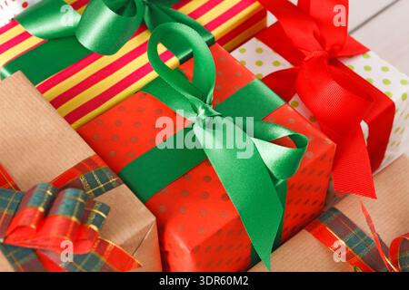 Different Wrapped Gifts Are Arranged on a Wooden Surface Stock Photo