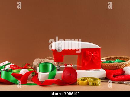 Creative Projects With a Sewing Machine on a Table Surrounded by Fabric and Craft Materials Stock Photo