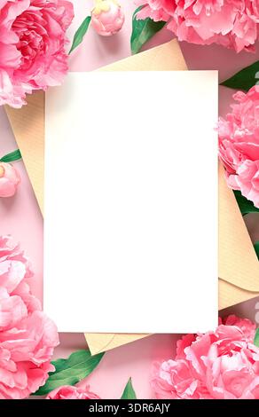Mock up card with peonies. Invitation card with envelope on grey background Stock Photo