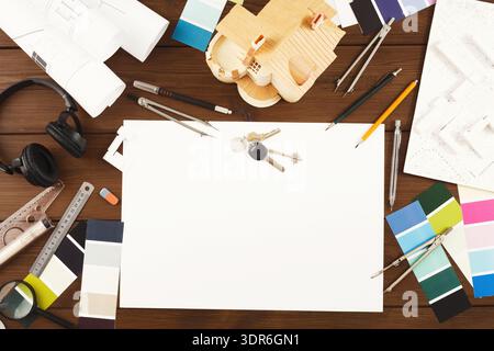Collection of Tools and Materials for Design Work Showing Different Colors and a Work Area Stock Photo