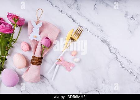 Spring Table Decor with Bunny Ornaments and Roses Stock Photo