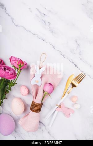 Easter Table Flat Lay with Bunny and Pastel Decor Stock Photo